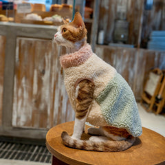 Close-up detail of the soft, thickened sherpa wool fabric and high-quality stitching on a fleece cat vest for winter warmth